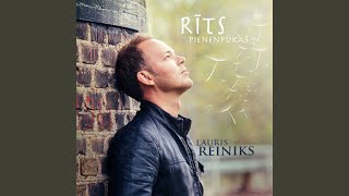 Video thumbnail of "Lauris Reiniks - Rīts Pieneņpūkās"