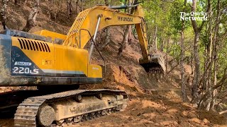Excavator Constructing A New Road In The Bush