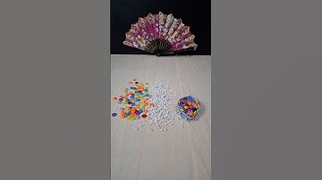 Reverse video of smile beads and white emoji #satisfying #asmr #shorts