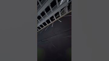 FPV Drone Wallride on Glass Building