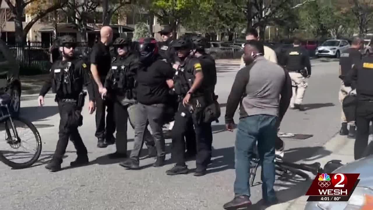 Protester detained during rally outside ICE facility in Orlando