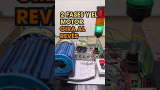 Do you know how to safely reverse the rotation of a three-phase motor?