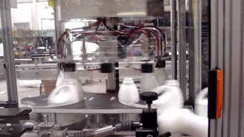AIS Container Handling / High speed bottle leak tester