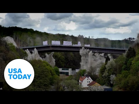 Bridge demolition using 330 pounds of explosives leaves crowd in awe | USA TODAY