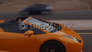Cinemastock - B Roll & Stock Footage - Lambo Driving Down The Freeway