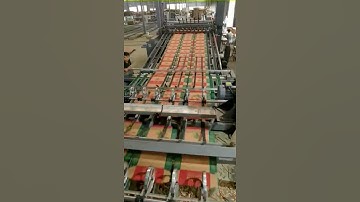 High speed corrugated carton box vibrator stacker