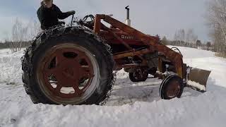 Farmall Super M - Working in the Woods and Skidding Trees to the Landing
