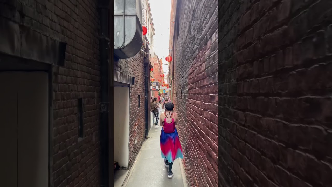 Walking down the narrow alley in Victoria BC