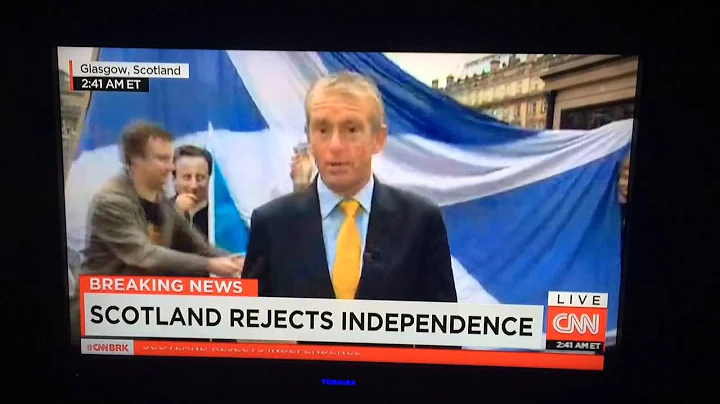 Drunk Scottish Woman Flips Off CNN Camera