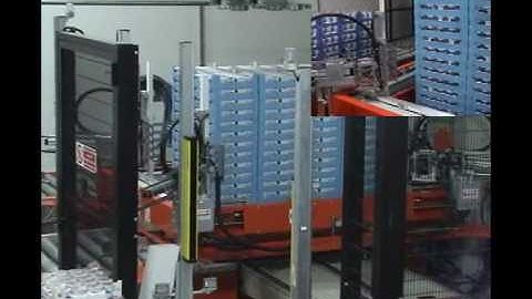 06 - Horizontal strapping machine with corner applications device