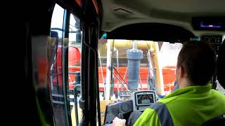 CabView in Caterpillar 972M XE wheel loaders loads truck Gopro Hero 8 and media mod mic