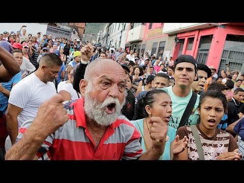 Hundreds are arrested in Venezuela during food riots and looting