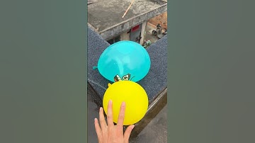 Experiment: Will a water balloon explode if it rolls down from a tall building? 💥🎈#shorts