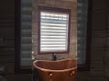 Motorized Hunter Douglas shade in Coeur d'Alene home