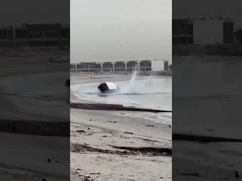 On a beach in Kuwait, man tests the Toyota Landrcuier FJ auto eject feature 🚀