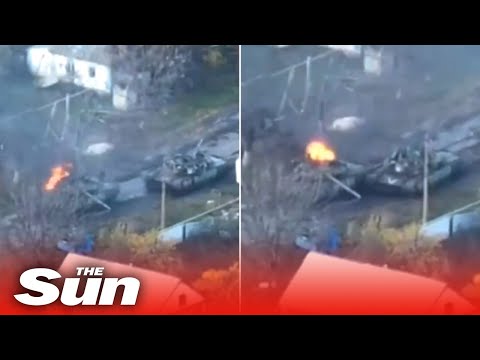 Russian T-80 tank drives away whilst on fire forcing troops inside to flee