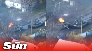 Russian T-80 tank drives away whilst on fire forcing troops inside to flee