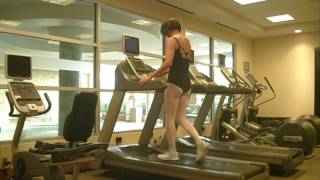 crossdresser in sexy black leotard in gym 2