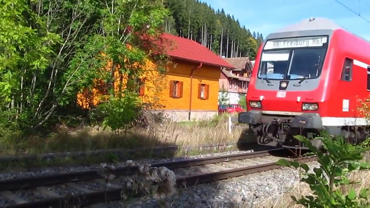 Double-Decker train to Freiberg runs through Titisee - YouTube