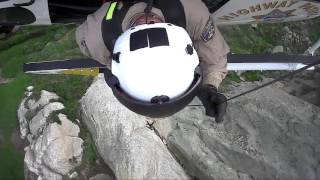 Firefighter Battles Wind to Rescue Man Stuck on Rock After Proposal