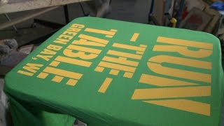Aaron Rodgers gives T-shirt makers new material