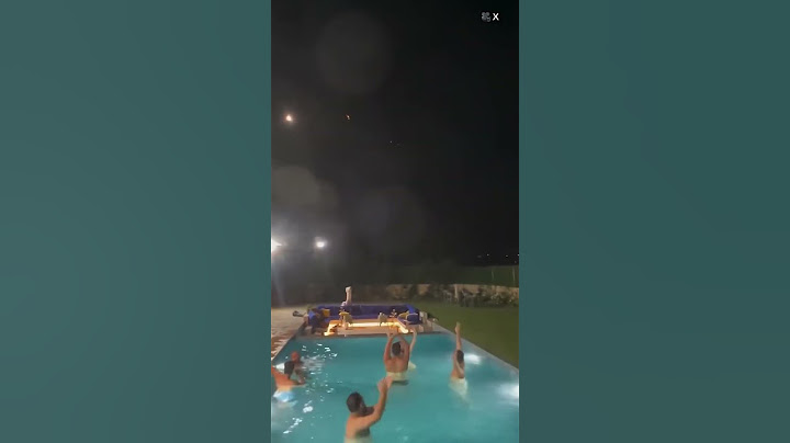 Lebanese pool party cheers as Iranian missiles fly over