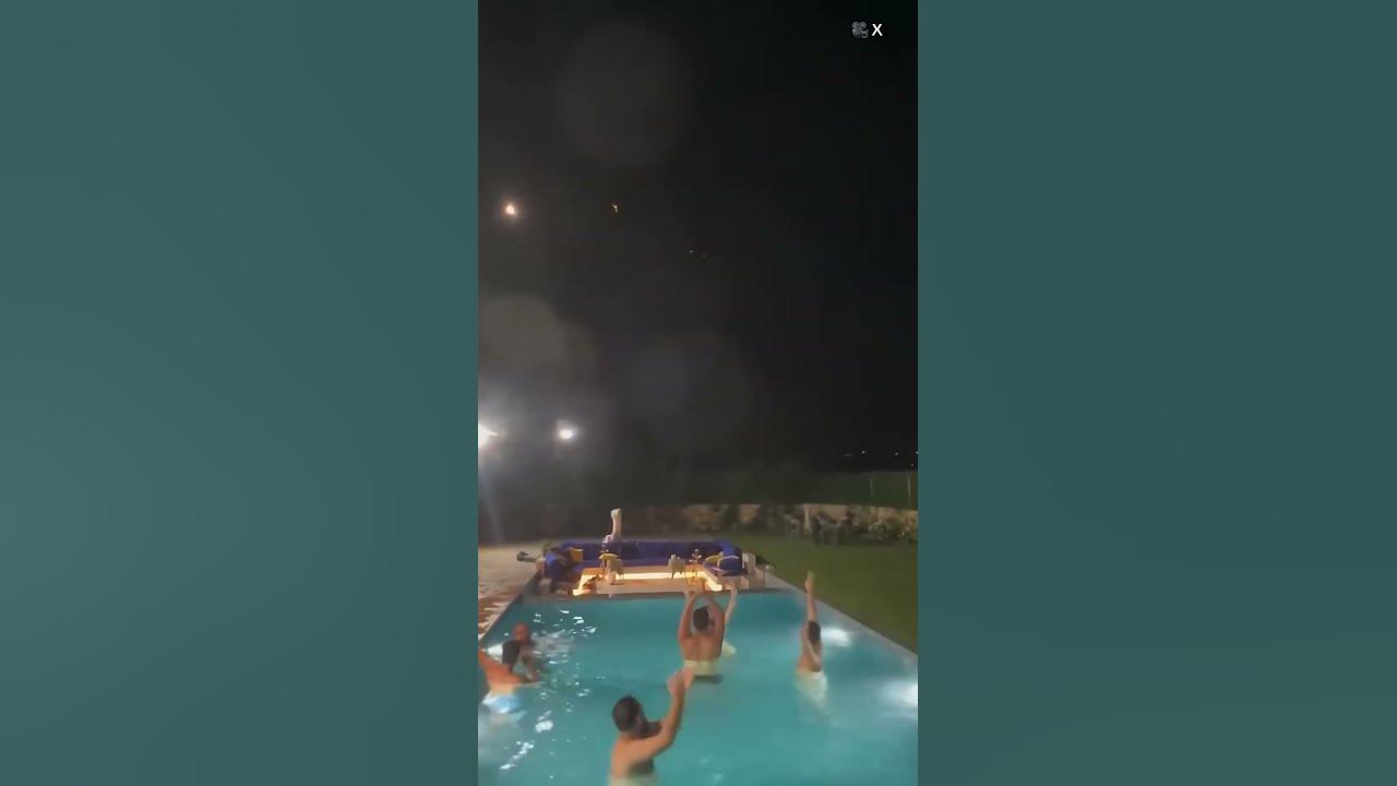 Lebanese pool party cheers as Iranian missiles fly over Lebanese pool party cheers as Iranian missiles fly over