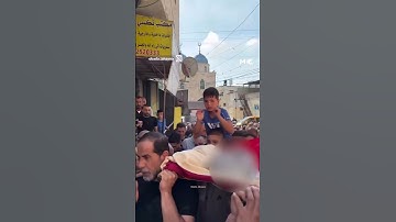 Palestinian child attends funeral for father killed by Israeli forces in the occupied West Bank