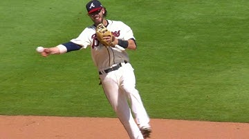 NYM@ATL: Swanson makes tough stop, fires for the out