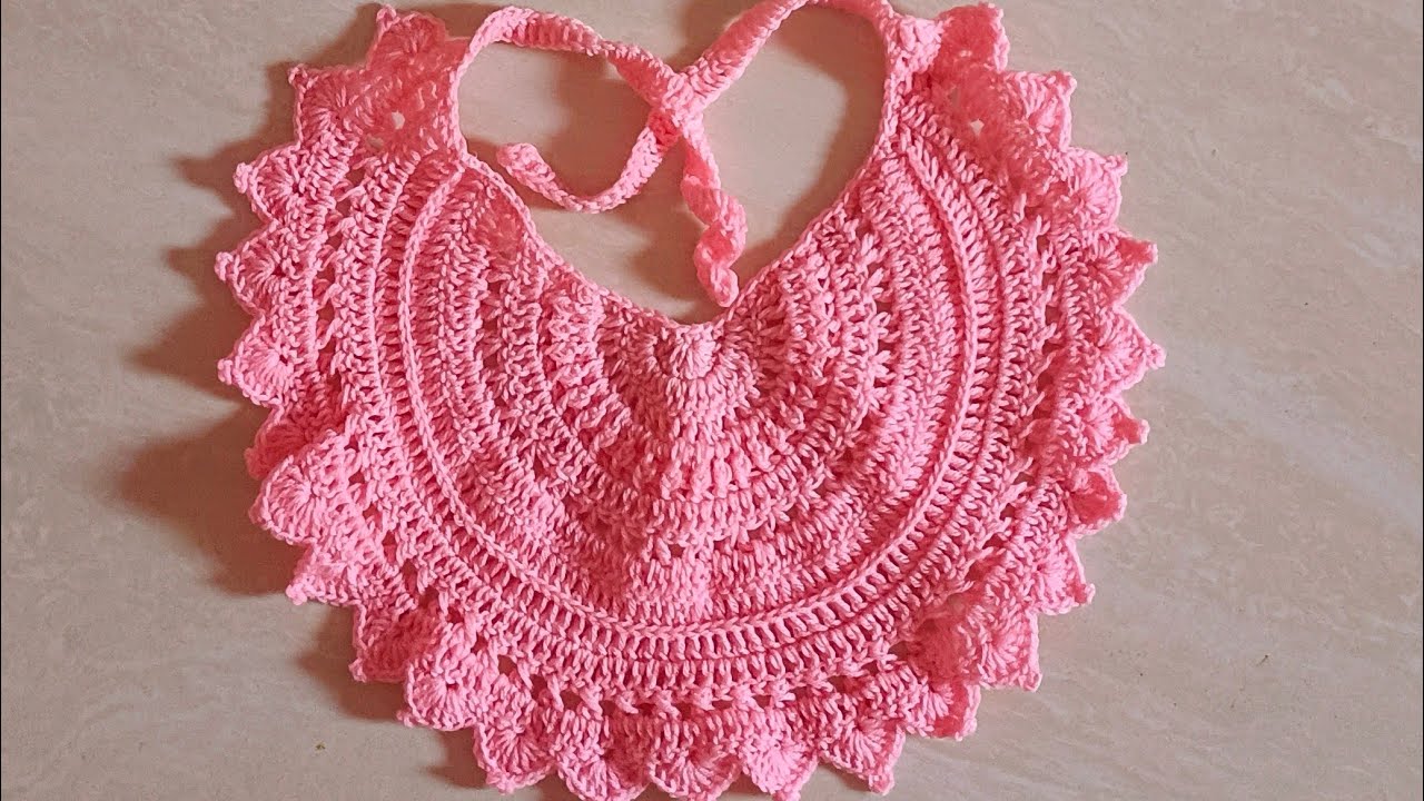 A beautiful bib by crochet 🧶🧶