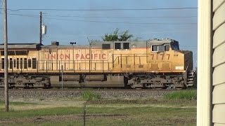 UP Power leads Northbound BNSF Coal train at Rogers, TX