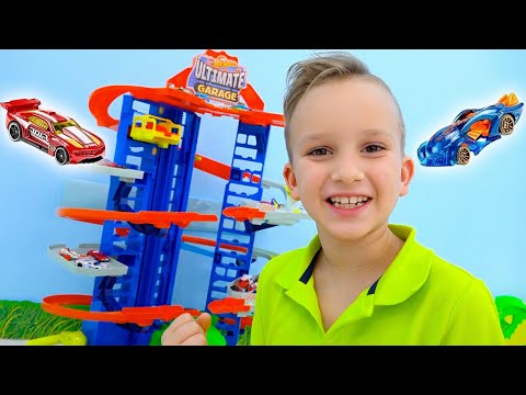 Влад и Никита играют в автомойку и строят город Hot Wheels