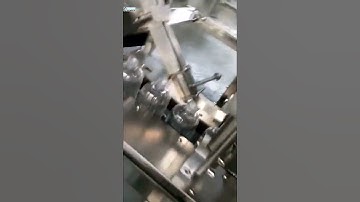 Automatic bottle labeling machine and automatic capping machine
