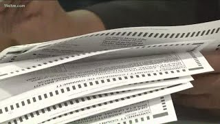 Some counties have started processing absentee ballots for the runoff election