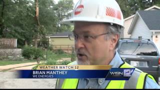 Utility poles damaged by falling tree banches