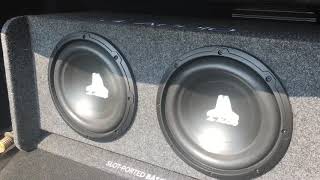 JL w0v3 audio 10 inch subwoofers flexing trunk with loud clear bass