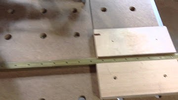 Fabricating a brass busbar.  Tapping brass with a cordless drill.