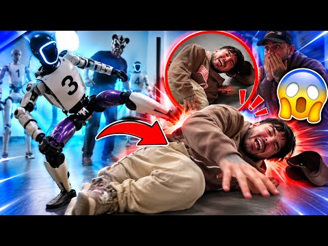 YOLO BUYS ROBOTS AND ONE ATTACKS HIM AND KNOCKS HIM TO THE GROUND 🤖💥