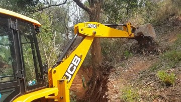 jcb vs big tree || jcb pushing down a big tree while Constructing a new road