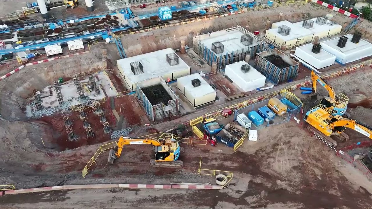 Bridge Construction Progress: Tower Crane Installation and U-Beam Decking