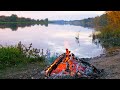 Bonfire by the river. Relaxing crackling firewood and sounds of nature, birds sing