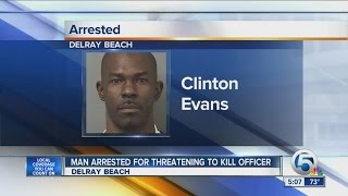 Man arrested for threatening to kill officer