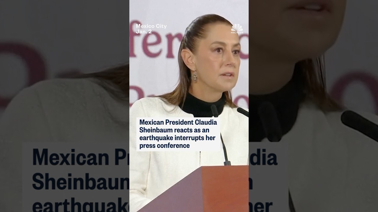 Mexican President Claudia Sheinbaum reacts as an earthquake interrupts her press conference
