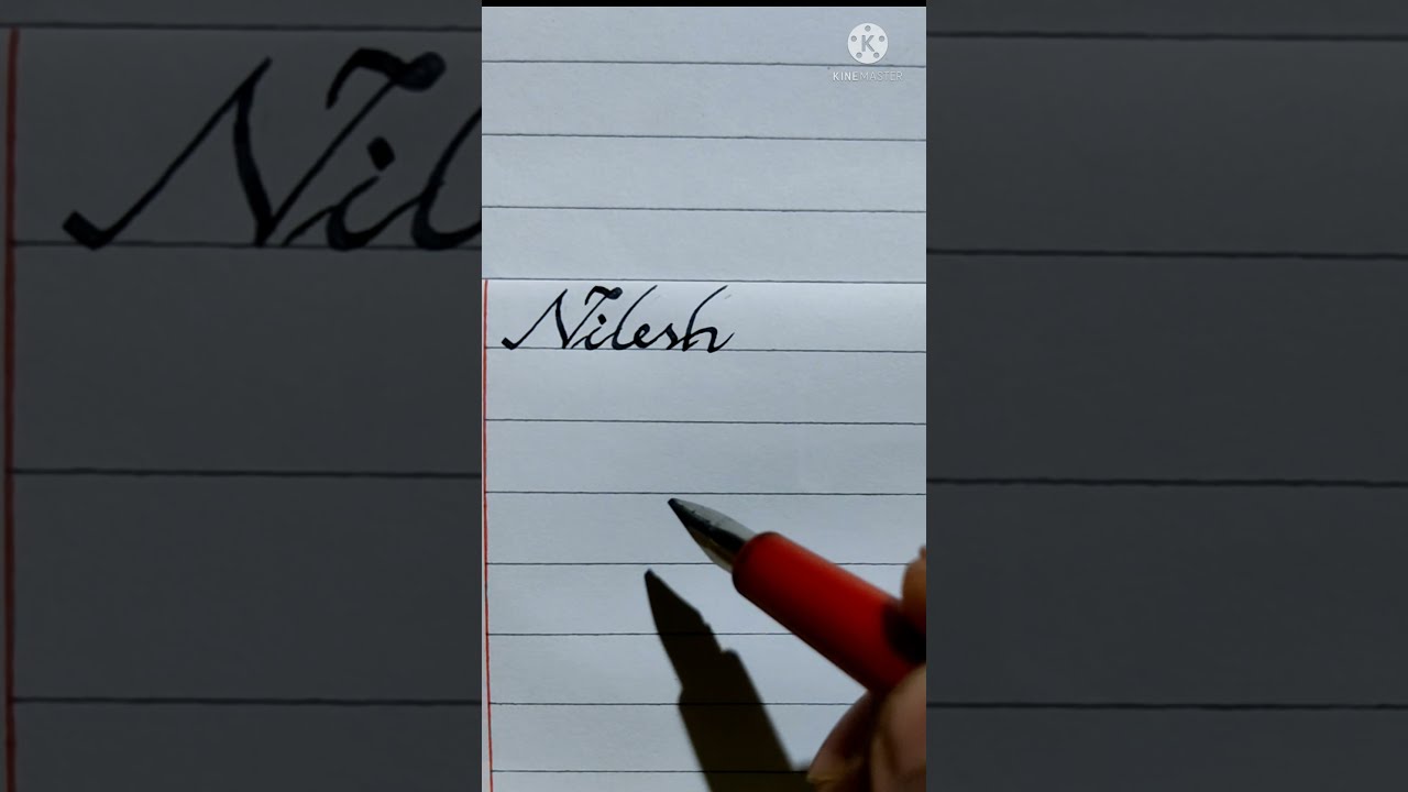 Nilesh   name in clean cursive handwriting  calligraphy handwriting style  shorts