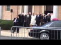 Tim Berra carries ex-Yankees legend Yogi Berra's ashes out of his funeral