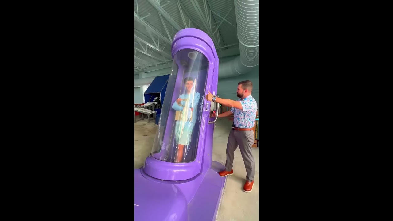 Gold Play Button Down A Water Slide At Kalahari Resorts Texas Shorts