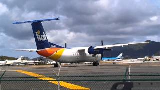 St Maarten Airport prop plane taking off