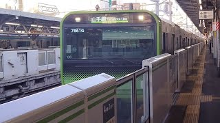 JR東日本E235系0番台06編成(JRE MALL ふるさと納税ラッピング車)が大崎行きとして神田駅に入線到着停車するシーン(7861G)2023/11/18