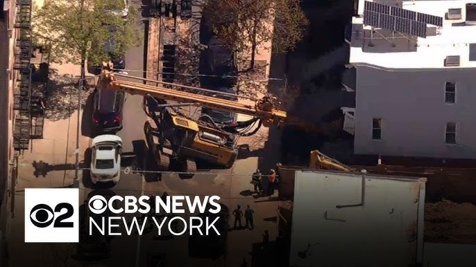 Construction Equipment Falls On Brooklyn Building