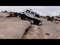 1250 L Unimog up edge on Moab's Poison Spider Trifecta 2021